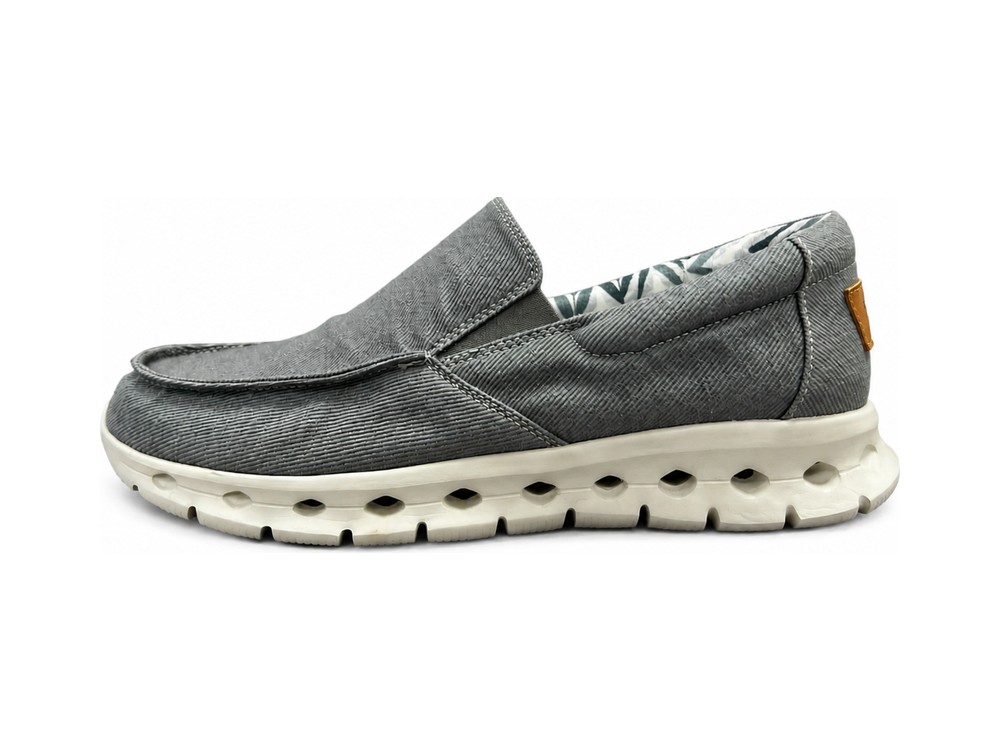 OEM/ODM grey washed-canvas slip-on with a moc-toe seam, patterned textile lining, leather heel tab and a cream midsole with scalloped cut-outs, manufactured by DOING Footwear