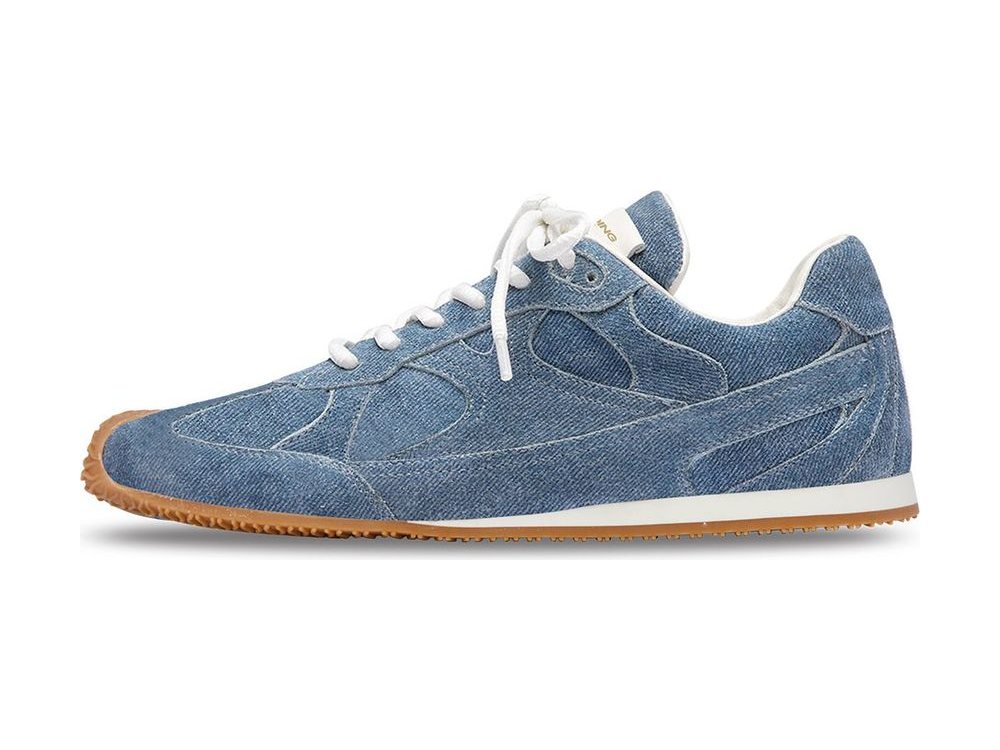 OEM/ODM washed blue denim runner with tonal denim overlay panels, white round laces, a white foxing strip and a gum outsole, manufactured by DOING Footwear